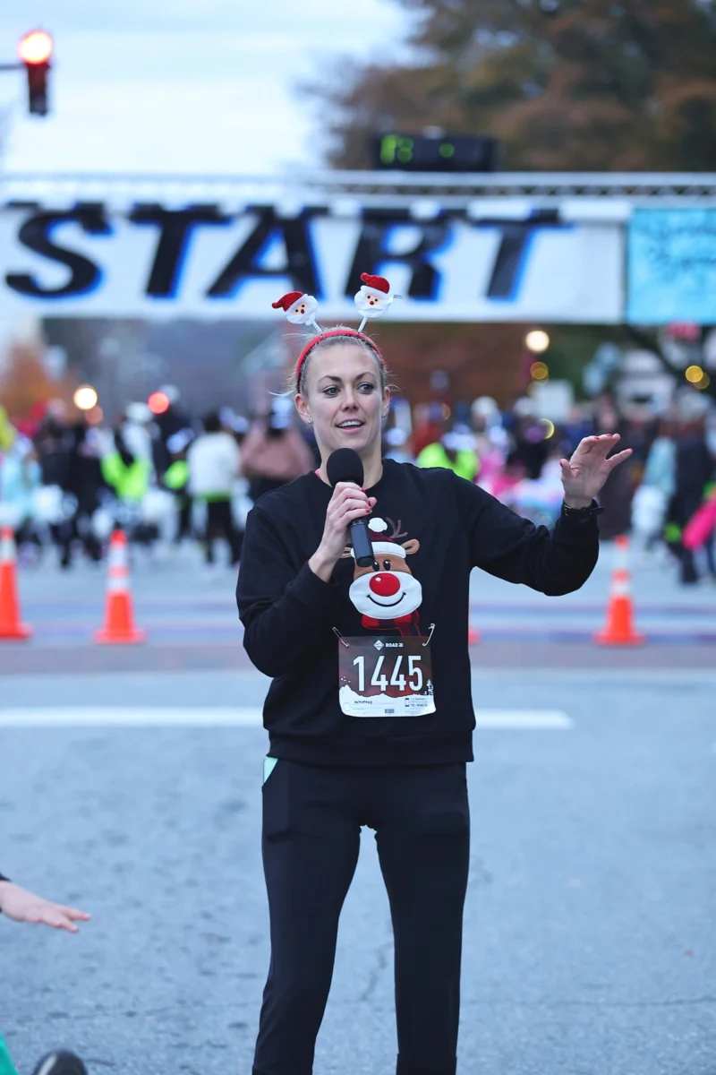 Whitney Swanson pictured leading the warm up at Sleighbells on the Square 5K