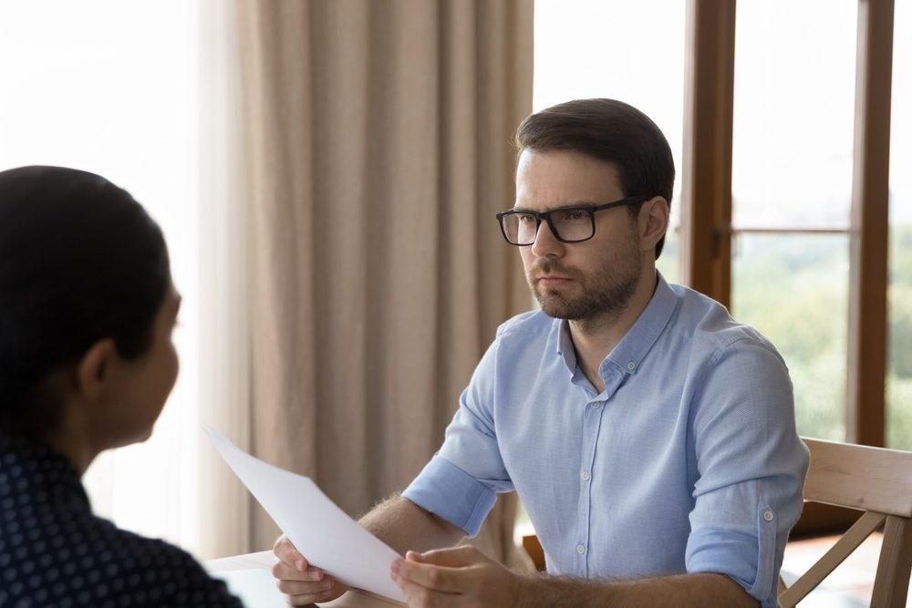 An attorney listens intently as his client asks him, “What is the average settlement for a fractured sternum?”