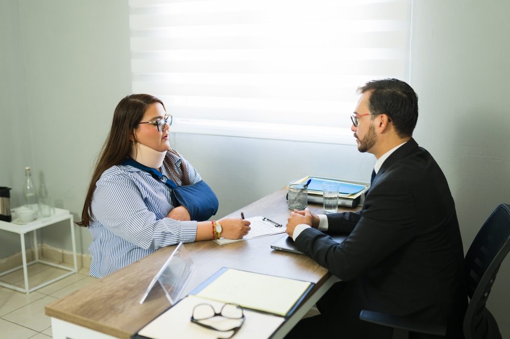 A lawyer explains to his client what evidence is needed for an injury claim.