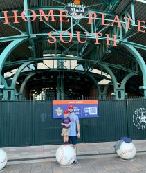 Attorney Chase Swanson with his son at the World Series